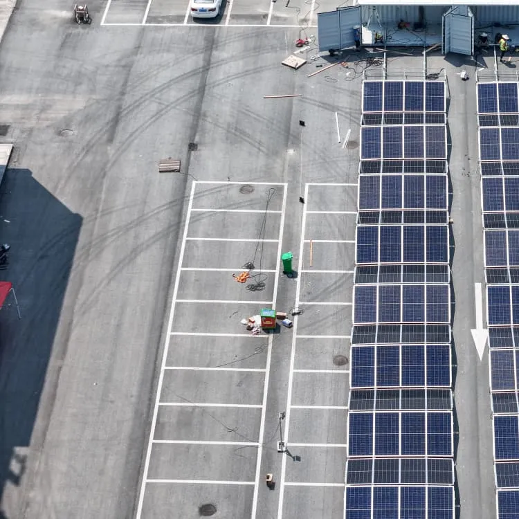 Container solar panel folding station